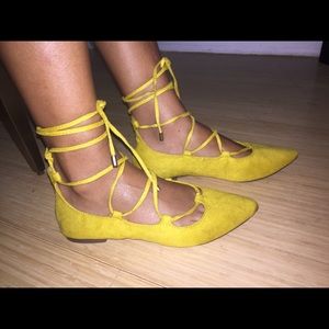 Yellow lace up flats